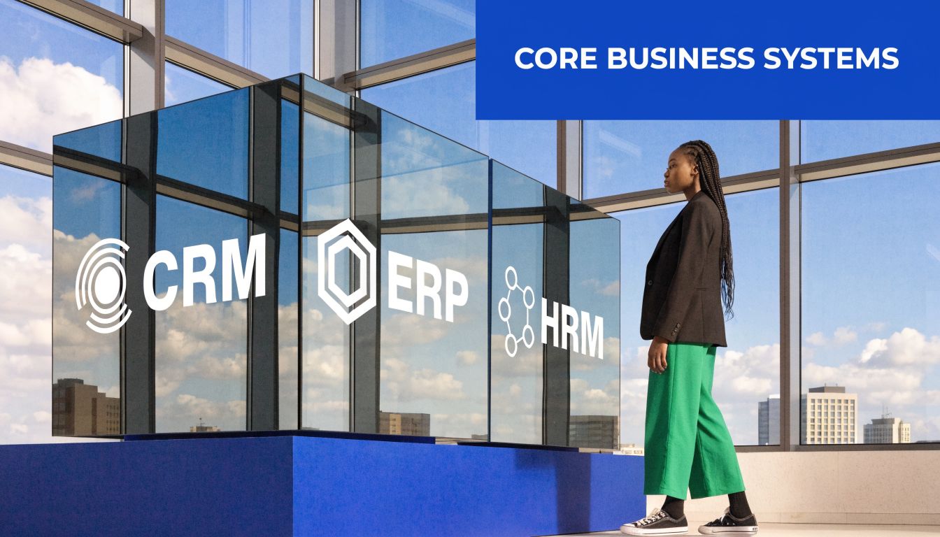 A woman stands beside a large glass display featuring CRM, ERP, and HRM business software system icons.