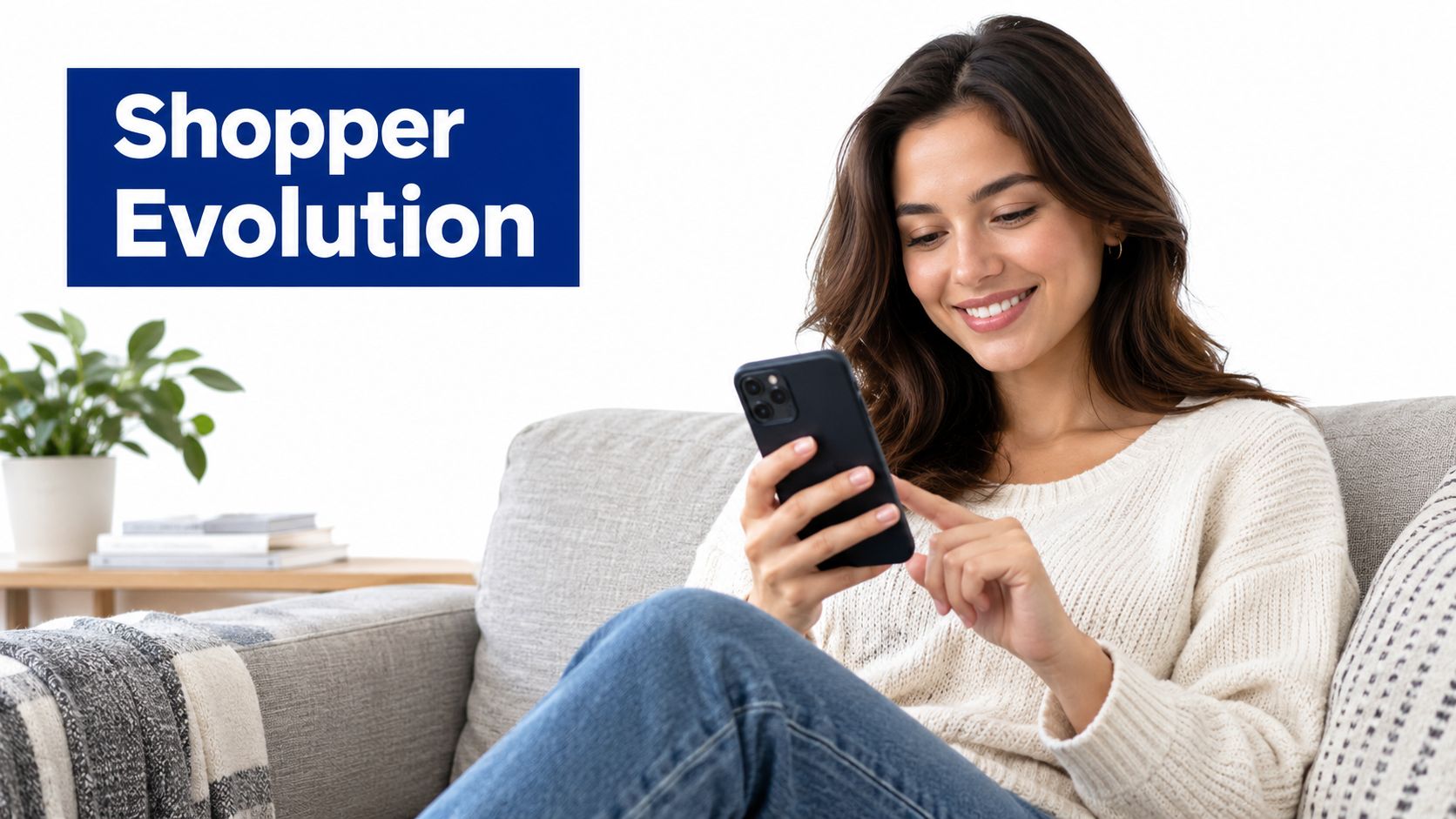 A smiling young woman sitting on a comfortable sofa while using her smartphone at home.